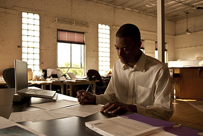 A man working at a desk.